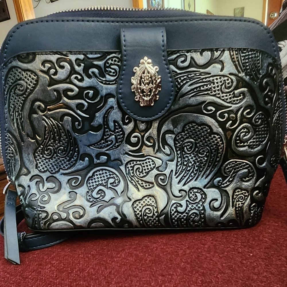 M.C. Marc Chantel Domed, tooled leather crossbody purse